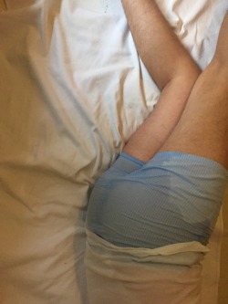wetdude792:  Wetting the bed - light blue boxer shorts
