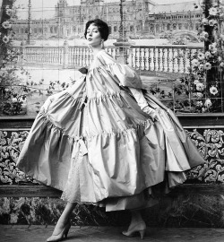 wehadfacesthen:  Suzy Parker in a taffeta evening coat by Manuel Pertegaz in a photo by Henry Clarke for British Vogue, 1954 