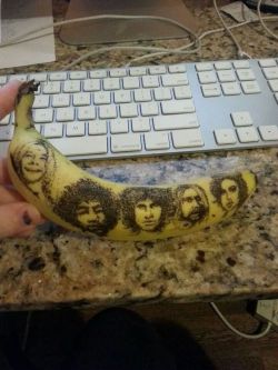 stunningpicture:  My friend stuck some faces into a banana using a needle. (Janis, Jimi, Jim, Kurt and Amy)