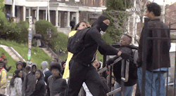 somalisupremacy:  killerdyke:  micdotcom:  Watch: An angry mom dragged her son out of the Baltimore riots This Baltimore mother was not pleased to see her son rioting across the city on Monday. And she did not hide her disdain. After recognizing her