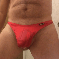 stacheman76:Piss squirt in red thong Sooo hot!