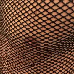randy9bis: One of the pluses of a fishnet top: it presents nipples sexily !  :-) Now let’s reshoot the pic with a boi with pierced nipples through which he is wearing little straight stainless-steel barbells !  ;-) 