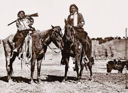georgebeast:  At one point, every child growing up on the Ute reservation knew how to ride a horse; it was a point of pride. These mounted Ute youths are adorned in typical fashion, with a breastplate of long hair pipes, usually two, but in some cases