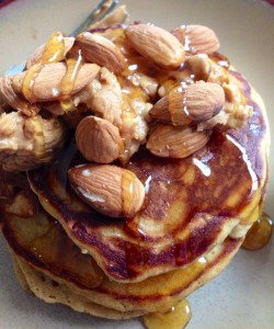 deadlifts-and-donuts:  Crunchy peanut butter, honey, and almonds. On my perfectly cooked pancakes.
