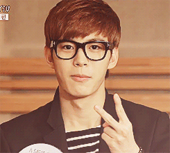 yixning:  hongbin looking beautiful in glasses on “a song for you” 