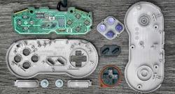 cinemagorgeous:  Many generations of game controllers, taken apart by Brandon Allen. 