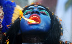 sadhaka-universal:  An Indian woman dressed as the Hindu goddess Kali appeared to breathe fire in a Ram Navami procession in Allahabad. The festival celebrates the birthday of Lord Ram.