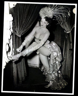 Showgirl at NYC&rsquo;s &lsquo;Latin Quarter&rsquo; nightclub prepares for another show..