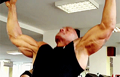 Dwayne Johnson There are so many things about this gif that I love, from that dimple by his mouth to those beautiful beautiful guns.  The one thing though that gets me really going is that sexy little tummy peak, Oh the things that are going through my
