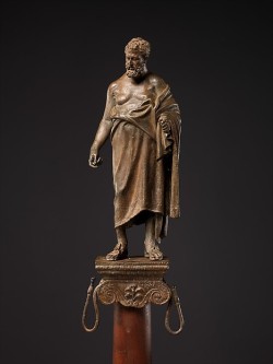 ancientpeoples:  Bronze statuette of a philosopher on a lamp standLate 1st Century BCEarly Imperial, Augustan  Adaptation of a Greek statue of the 3rd century B.C.Among the preserved monuments of ancient art, there is no more sympathetic portrait of the