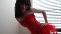 Mygirlfund&rsquo;s smiley showing off in a sexy red corset