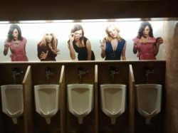 xrayeyesblue:  femdomculture: Men’s restroom decor like this - depicting voyeuristic size queens hovering over the urinals armed with rulers, magnifying glasses, and cameras - would have been considered vulgar and demeaning to men in years past. In