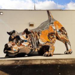 chocolatecakesandthickmilkshakes:  fer1972:  Chrome Dog Mural by Bik Ismo  I thought this was a statue.