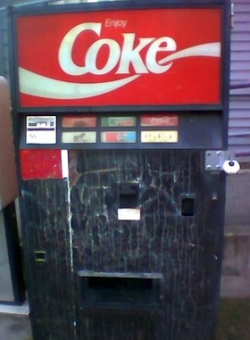sixpenceee:  Seattle’s Mystery Soda Machine On the corner of John Street and 10th Avenue East, in the heart of Seattle’s Capitol Hill neighborhood lies the world’s most mysterious soda vending machine. Nobody knows the true history of the rusting