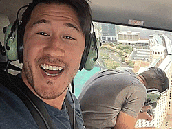 markisepticeye:  How cool! Mark is riding in a helicopter! I was kinda worried that he or the guy taking the pictures would drop thier camera at one point XD(x)
