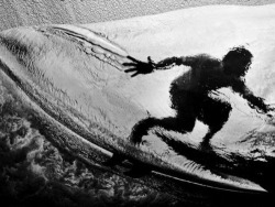 Into the fifth dimension (underwater photo of a surfer)