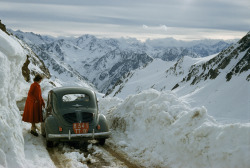 giggle:  A woman surveys a treacherous mountain pass in the Pyrenees of France, 1956  -  Photograph by Justin Locke, National Geographic   