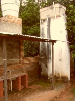 uruboros:  This was in the backyard of a house I lived at in Paraguay. The town had a main water pump that would sometimes shut down so we also needed a water tank. There was one time where the tank was empty and we didn’t have any running water except