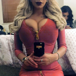 Squeeze into that dress.A bimbo makes it work!