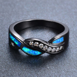 asianface6: ieatrainbows6:  ashisnotokay:  a-rainbow-named-ally:  saltycaffeine:  Elegant and Unique Black Gold Filled Blue Fire Opal Rings. These Simple yet Beautiful Rings are the perfect Gifts for your friends, family or lover! ***USE COUPON CODE: