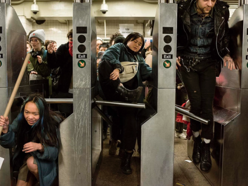 fuckyeahmarxismleninism:    NYers Jump Turnstiles En Masse To Protest Police Brutality On The Subway   Close to 1,000 people marched through Downtown Brooklyn on Friday night to protest police brutality and a recent crackdown on fare evasion inside the