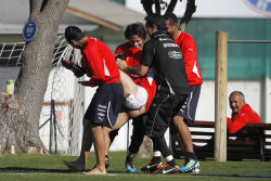 Chilean soccer player force-stripped by team mates. [#soccer #nude #publicnudity #stripped #force-stripped