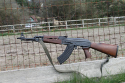 assaultriflegunblr:  Zastava PAP; early type that came as a single stack with plastic thumbhole stock. Converted to double stack magazine, Ironwood furniture and threaded muzzle to take the slant muzzle brake.