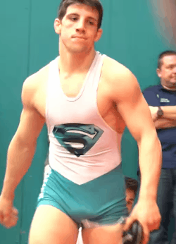 wrestleman199:this wrestler has it all! huge, bouncing bulge, tight singlet, and butt to go with it