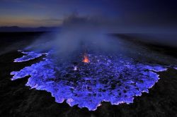 congenitaldisease:  This volcano in Indonesia produces blue lava. This is caused by the combustion of sulphuric gasses at very high temperatures.  