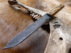 ru-titley-knives:  This large blade was forged by Alex over at alphabushcraft.co.uk  under the tuition of Dave Budd  Blacksmith and knifemaker . Alex asked me to handle it up for him and I chose Bocote Mexican rosewood scales to match the colors from