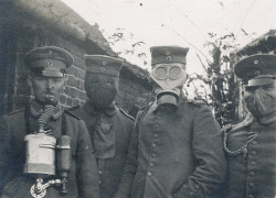 guns-gas-trenches:  German soldiers wearing the four different types of gas masks that were used in WWI 