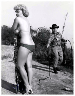 WHIP TEASE Jennie Lee appears in the pages of the December &lsquo;54 issue of 'TAB&rsquo;; a popular Men&rsquo;s Digest.. She&rsquo;s shown losing various articles of her clothing from a 15-foot bullwhip wielded by expert handler: Dave Kashner..