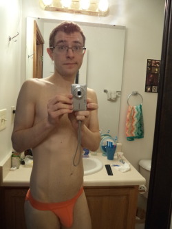bikinithonglover:  A tanga brief I got from Amazon a while back, mostly because I wanted something orange. The material is very stretchy and form fitting. Its a little loose on my butt though, which can be annoying, even if it shows off a tasteful amount