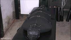 slave4eva:  “leather mask slave in body bag left alone&quot; http://clips4sale.com/88404/14910301