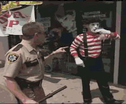mawrf:  furriesforlife:  beatyourselfup:  Mime implies that the cop is a fascist NaziCop shows the Mime is correct by beating him  lets clear some things up shall we? first of all, i am gaining the feeling that the word facist does not get understand