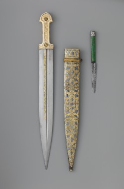art-of-swords:  Qama Dagger with Sheath and Knife Dated: 1856–57 Culture: Caucasian Medium: steel, bone, silver, gold, shark skin, ivory, niello, iron Measurements: dagger - overall length with sheath 19 ¼ inches (48.9 cm); length without sheath 19