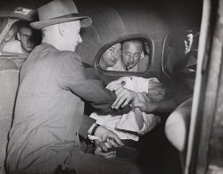  Weegee (Arthur Fellig). Harold Horn, Knocked Over Milk Wagon with Stolen Car. 1941  