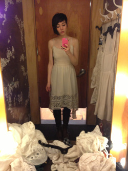 alexaunderground:  Trying on millions of cream colored dresses at Urban Outfitters.