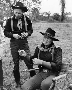 shopmidnightrider:  John Wayne and William Holden, during the filming of “The Horse Soldiers.” Louisiana, 1959   Great movie :)