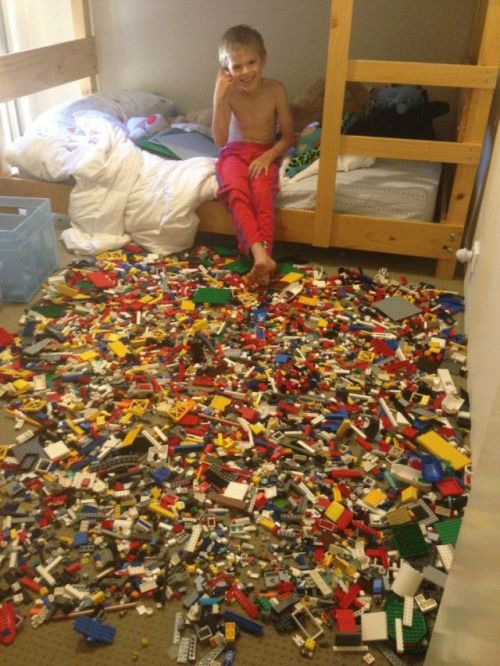 Well played kid legos on floor