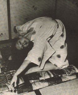 sweetguacamole: ‘Allegra Kent doing floor exercises in Japan, wearing her pa’s pajamas.’ From the book The Dancer’s Body Book. 