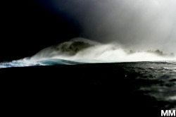 morganmaassen:  An angry squall moves over Pipeline, Hawaii. 