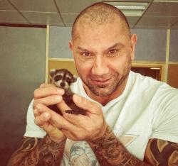 awwww-cute:  Drax the Destroyer and a baby raccoon  Bebe Rocket!