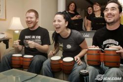 celebgames:  Here’s a photo of the band evanescence playing donkey konga in 2004.  