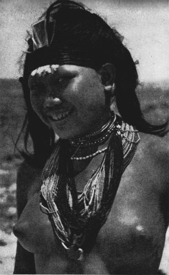   Via Islands and Peoples of the Indies, by Raymonf Kennedy.  Mentawei girl with teeth filed to points