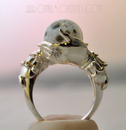 omniastudios:  In celebration of the full moon, here is The Celestial Oracle ring. Ethereal hands surround a beautifully crafted handmade glass full moon sphere. Limited edition.  www.omniaoddities.com