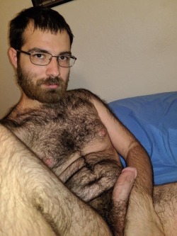manlybush: Grrrrr. He’s hot and hairy and I love how his long pubes wrap around the base of his cock.