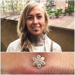 chaiatcalm:  I had the honor of upgrading @russinmumla’s face today at @calmbodymodification. Pretty 18k yellow gold flower from @anatometalinc for her #philtrum and (hardly visible due to smile) 18k yellow gold domes for her #cheekpiercings also from