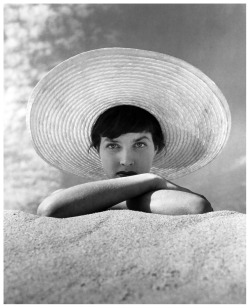  Regina Relang, Actress Ingrid Mirbach in straw hat on the beach on the island of Sylt, 1949   