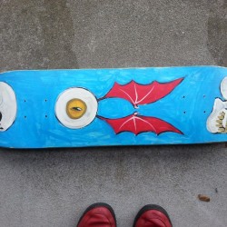 Bottom of the skulls and winged eyeball deck. 8.5&quot; wide